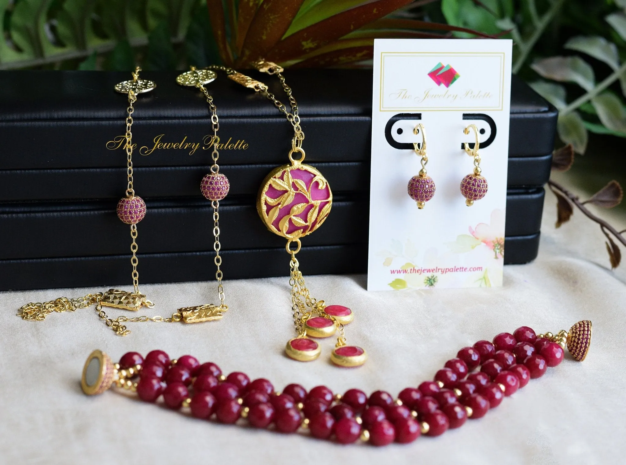 Fedora hoop earrings with round fuchsia zircon drop